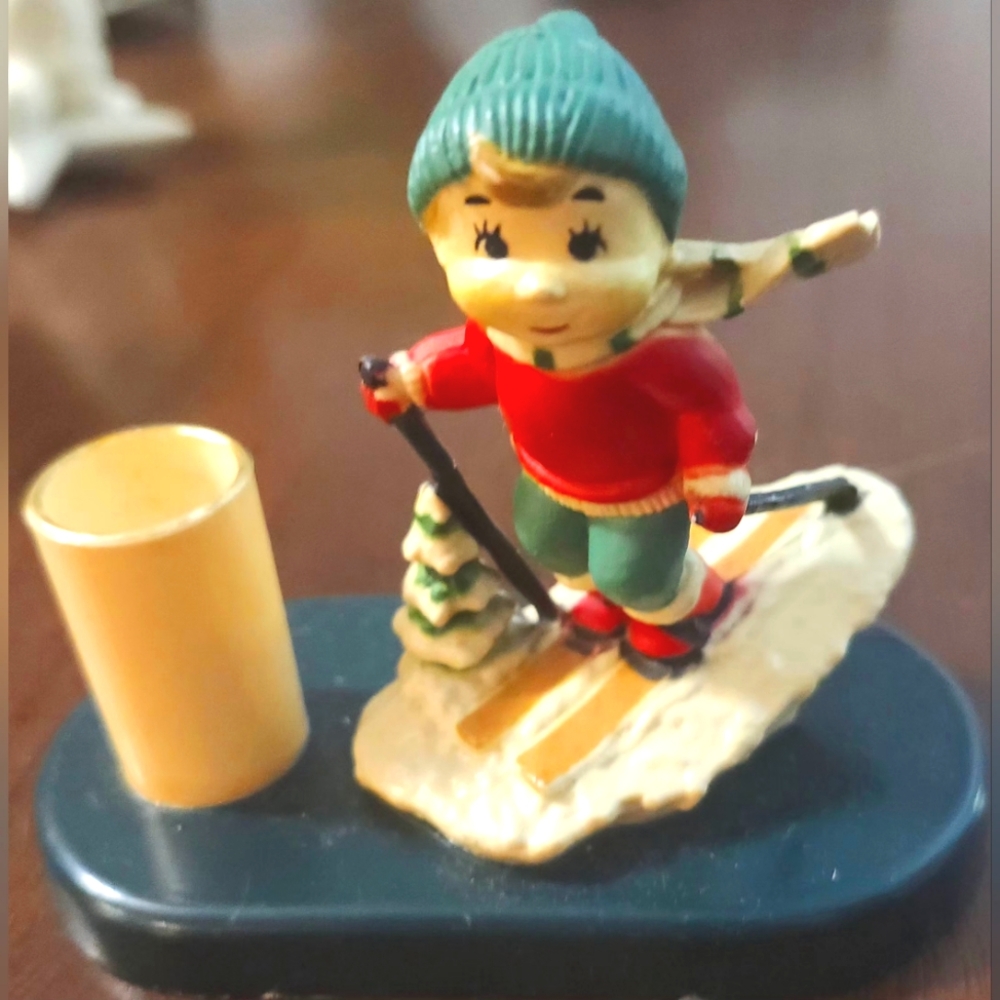 Red and Green Skiing Action Figure Toy